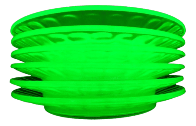 Uranium glass and other decorative items selling at auction
