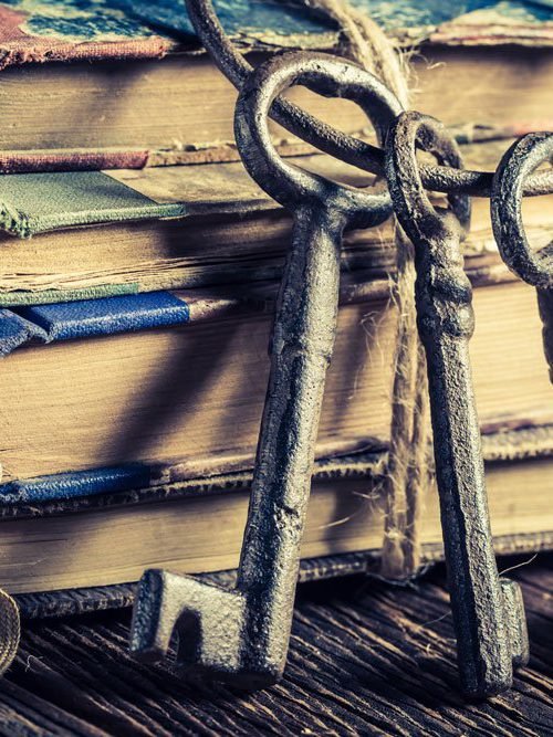 closeup of vintage keys and books
